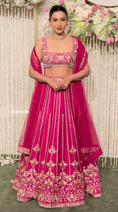 Gauhar Khan in a Rani Pink Embroidered Lehenga Set