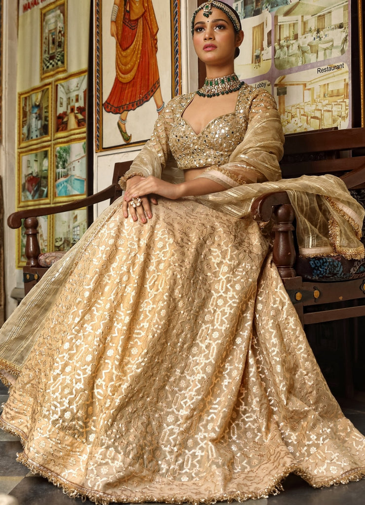 Gleaming fully embroidered designer lehenga with golden choli and contrast orange  dupatta - Zikimo.com - Original Indian Bridal Lehengas Collection
