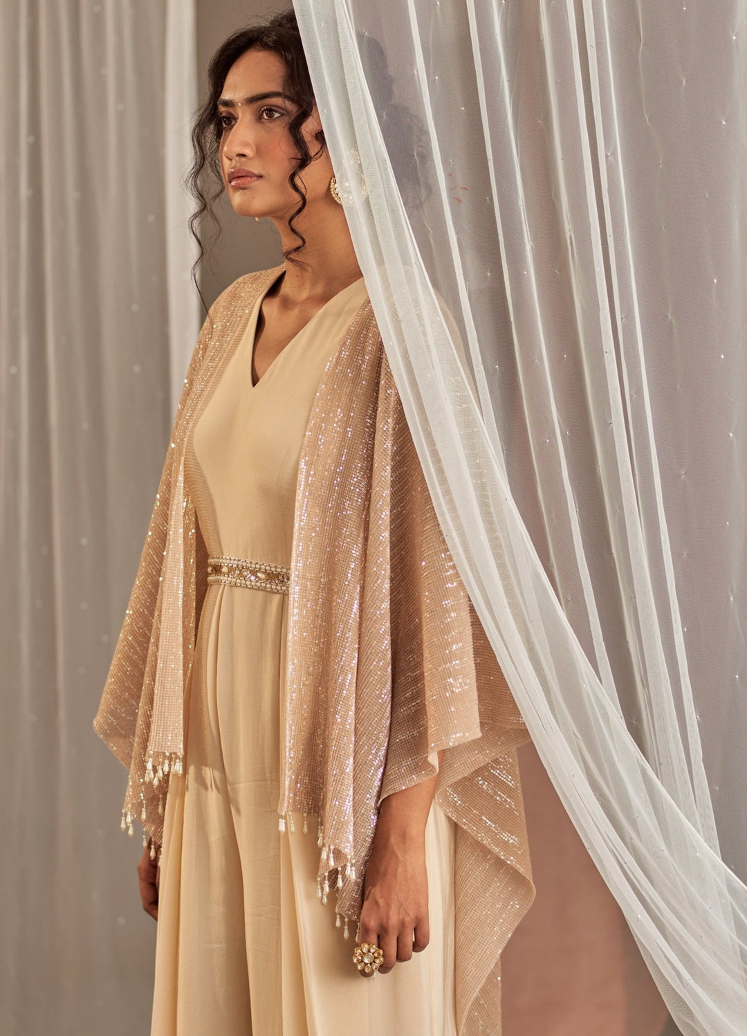 Champagne Crepe Jumpsuit With Cape And Belt Nidhika Shekhar Fabilicious Fashion