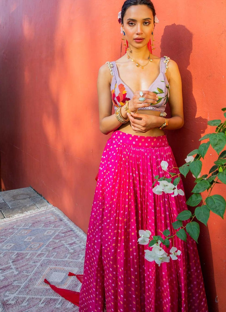 pink bandhani lehenga with lilac floral blouse and red dupattalehengathe little black bow