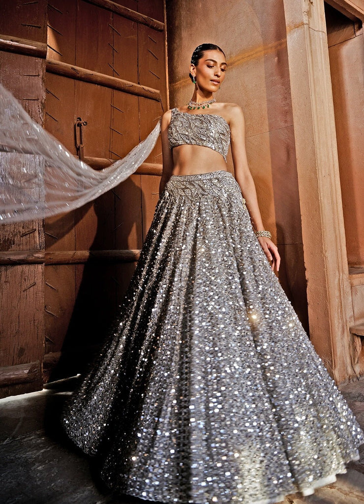 Shrena Hirawat | Latest bridal dresses, Shimmer lehenga, Silver blouse